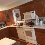 Before Hand Painted Kitchen Cabinets by Tuscany Designs